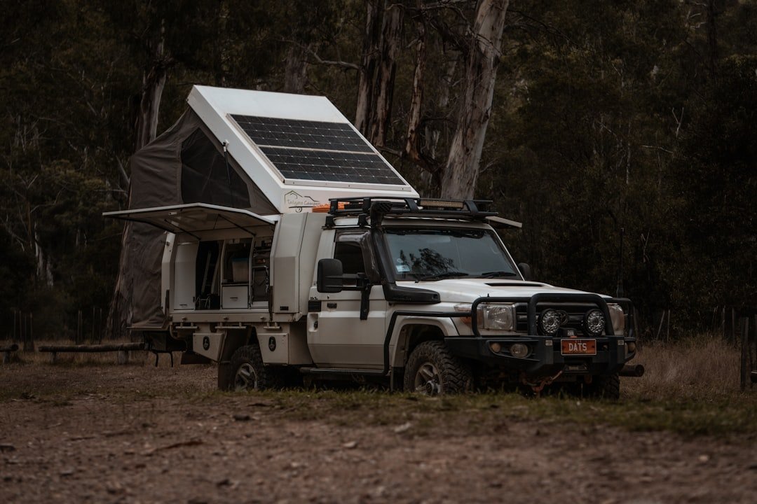 Solar panel mounted on a touring vehicle for off-grid 12V power